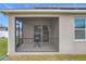 Exterior view of screened porch with solar panels at 2649 Howland Blvd, Deltona, FL 32738