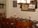 Dining room with formal table setting, natural light and elegant decor at 2803 Lido Key Ct, Kissimmee, FL 34747