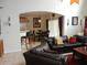 Inviting living room featuring a comfortable, large leather sectional sofa at 2803 Lido Key Ct, Kissimmee, FL 34747