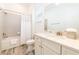 Clean bathroom with white cabinets and bathtub at 2962 Salted Rim Rd, Kissimmee, FL 34747