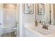 Clean bathroom with white vanity and a tub shower combo at 2971 Arranmore Dr, Ormond Beach, FL 32174