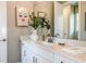 Elegant bathroom with a modern vanity and large mirror at 2971 Arranmore Dr, Ormond Beach, FL 32174