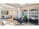 Elegant dining room features a large table, neutral tones, and modern decor at 2971 Arranmore Dr, Ormond Beach, FL 32174