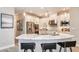 White kitchen with stainless steel appliances and marble countertops at 2971 Arranmore Dr, Ormond Beach, FL 32174