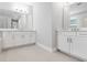 Bathroom with double sink vanity, modern lighting, and spacious layout at 2975 Arranmore Dr, Ormond Beach, FL 32174