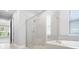 Bathroom with a walk-in shower, soaking tub, and double sink vanity at 2975 Arranmore Dr, Ormond Beach, FL 32174