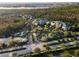 Community features pool, parking and surrounding landscape at 3050 Pirates Retreat Ct # 303, Kissimmee, FL 34747