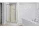 Large walk-in shower with glass enclosure and modern tile at 3050 Pirates Retreat Ct # 303, Kissimmee, FL 34747