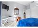 Bright bedroom with a comfy bed and workspace at 3050 Pirates Retreat Ct # 303, Kissimmee, FL 34747