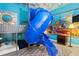 Playful bedroom with bunk beds and a slide at 3050 Pirates Retreat Ct # 303, Kissimmee, FL 34747