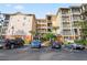 Three-story building with parking and landscaping at 3050 Pirates Retreat Ct # 303, Kissimmee, FL 34747