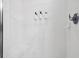 Spacious shower with white tile and built-in shower seat at 3050 Pirates Retreat Ct # 303, Kissimmee, FL 34747
