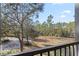 Peaceful wooded view from the balcony at 3050 Pirates Retreat Ct # 303, Kissimmee, FL 34747