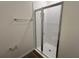 Shower with glass enclosure and tile surround at 3238 Arch Ave, Ormond Beach, FL 32174