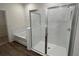 Bathroom with soaking tub and walk-in shower at 3238 Arch Ave, Ormond Beach, FL 32174