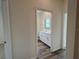 Clean bathroom with double vanity and vinyl flooring at 3238 Arch Ave, Ormond Beach, FL 32174
