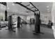 Well-equipped gym offers a variety of modern machines and equipment, and an open space for a versatile workout experience at 3238 Arch Ave, Ormond Beach, FL 32174