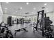 Fully-equipped gym with dumbbells, machines, and plenty of space at 3238 Arch Ave, Ormond Beach, FL 32174