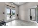 Bright lobby with tile flooring and a view of the front entrance at 3238 Arch Ave, Ormond Beach, FL 32174