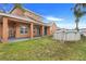 Large backyard with a above-ground pool and extended patio at 351 Michigan Estates Cir, St Cloud, FL 34769