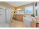Large bathroom featuring a walk-in shower and corner bathtub at 351 Michigan Estates Cir, St Cloud, FL 34769