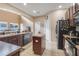 Well-equipped kitchen with dark wood cabinets and stainless steel appliances at 351 Michigan Estates Cir, St Cloud, FL 34769
