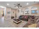Relaxing living room with sectional sofa and large windows at 351 Michigan Estates Cir, St Cloud, FL 34769