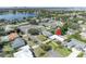 Aerial view of a single-Gathering home near a lake and city skyline at 4437 Elaine Pl, Orlando, FL 32812