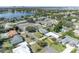 Aerial view of a single-Gathering home near a lake and city skyline at 4437 Elaine Pl, Orlando, FL 32812