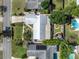 Aerial view showcasing the home's metal roof and spacious backyard at 4437 Elaine Pl, Orlando, FL 32812