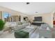 Bright living room with neutral colors, large windows, and modern decor at 4437 Elaine Pl, Orlando, FL 32812
