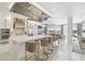 Modern kitchen with a large island and breakfast bar at 4922 Kensington Park Blvd, Orlando, FL 32819