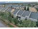 Aerial view of townhouses and landscape at 558 S Terrace Spring Dr, Orlando, FL 32828