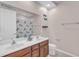 Double sink bathroom with shower/tub combo at 558 S Terrace Spring Dr, Orlando, FL 32828