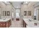 Double vanity bathroom with granite countertops at 558 S Terrace Spring Dr, Orlando, FL 32828