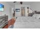 Main bedroom with hardwood floors and access to bathroom at 558 S Terrace Spring Dr, Orlando, FL 32828