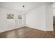 Spacious dining room featuring hardwood floors and modern light fixture at 722 W Kaley Ave, Orlando, FL 32805