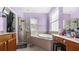 Primary bathroom with shower, garden tub, and double vanity at 728 Longford Loop, Apopka, FL 32703