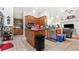 Spacious kitchen with an island and ample cabinetry at 728 Longford Loop, Apopka, FL 32703