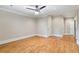 Large bedroom with hardwood floors and plenty of natural light at 832 N Summerlin Ave, Orlando, FL 32803