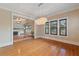 Elegant dining room with hardwood floors and views to living room at 832 N Summerlin Ave, Orlando, FL 32803