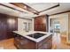 Spacious kitchen island with cooktop and lots of custom cabinets, with views to breakfast nook at 832 N Summerlin Ave, Orlando, FL 32803