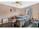 Bedroom with queen bed and adjacent closet at 860 Oak Dr, Groveland, FL 34736