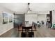 Farmhouse-style dining room with a barn door and chandelier at 860 Oak Dr, Groveland, FL 34736