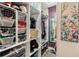 Spacious walk-in closet with ample shelving and storage at 860 Oak Dr, Groveland, FL 34736