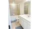 Bathroom with white cabinets and a bathtub at 10876 Waterwood Aly, Orlando, FL 32829