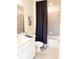 Bathroom with tub shower, and white vanity at 10876 Waterwood Aly, Orlando, FL 32829