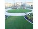 Relaxing community green space with artificial turf at 10876 Waterwood Aly, Orlando, FL 32829