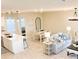 Open concept dining area with table and chairs adjacent to the kitchen at 10876 Waterwood Aly, Orlando, FL 32829