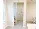 View of entry from kitchen, tile floors at 10876 Waterwood Aly, Orlando, FL 32829